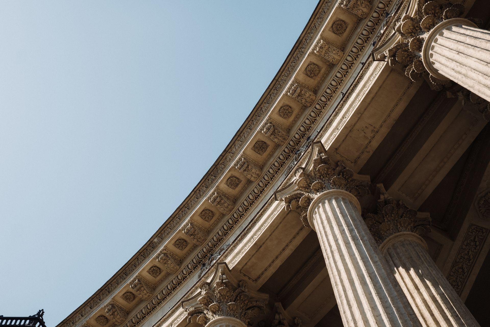 Stone columns under a clear sky
